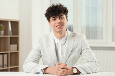 Photo of Young man having online video call at home, view from web camera