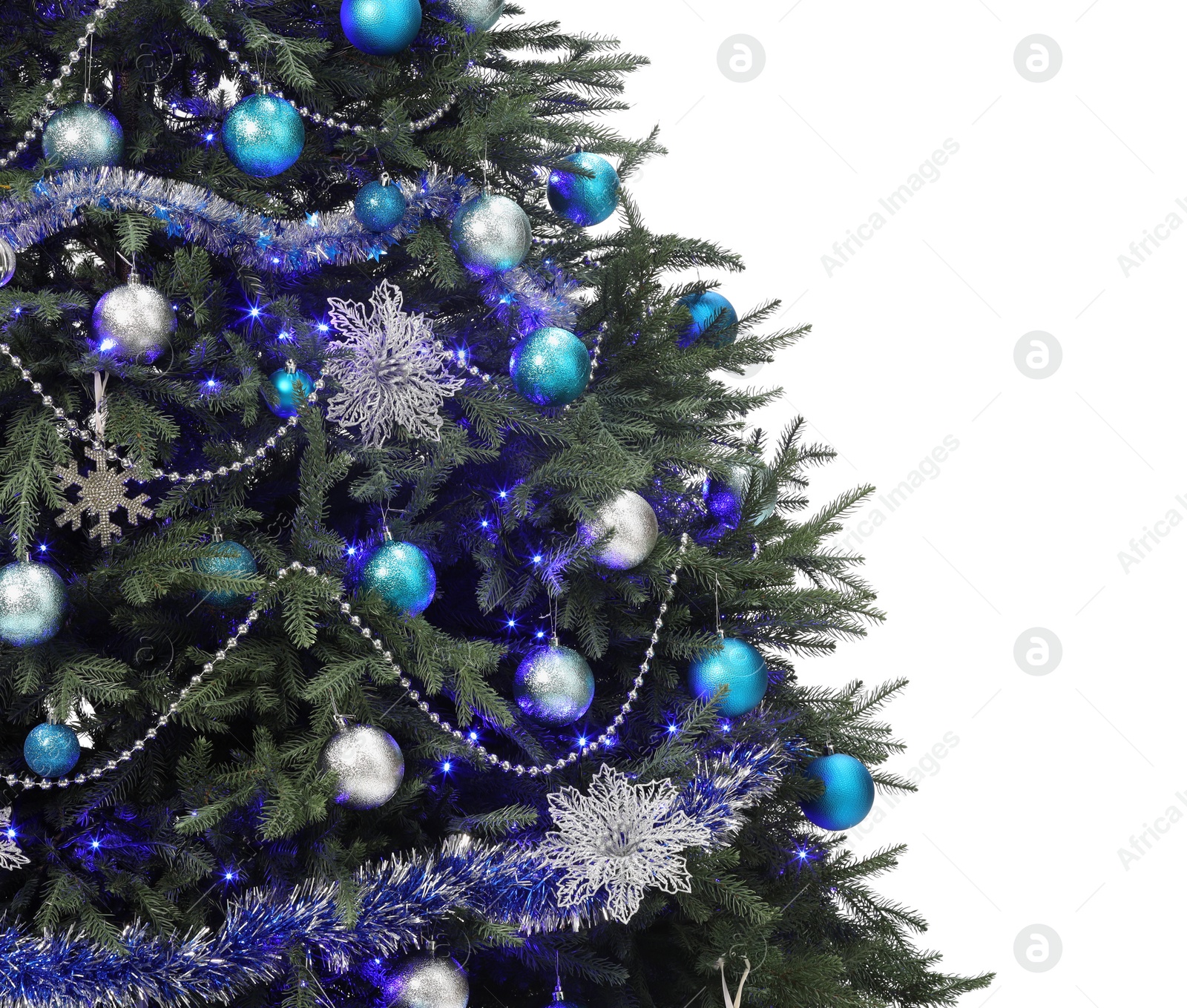 Photo of Beautiful Christmas tree decorated with ornaments and festive lights isolated on white