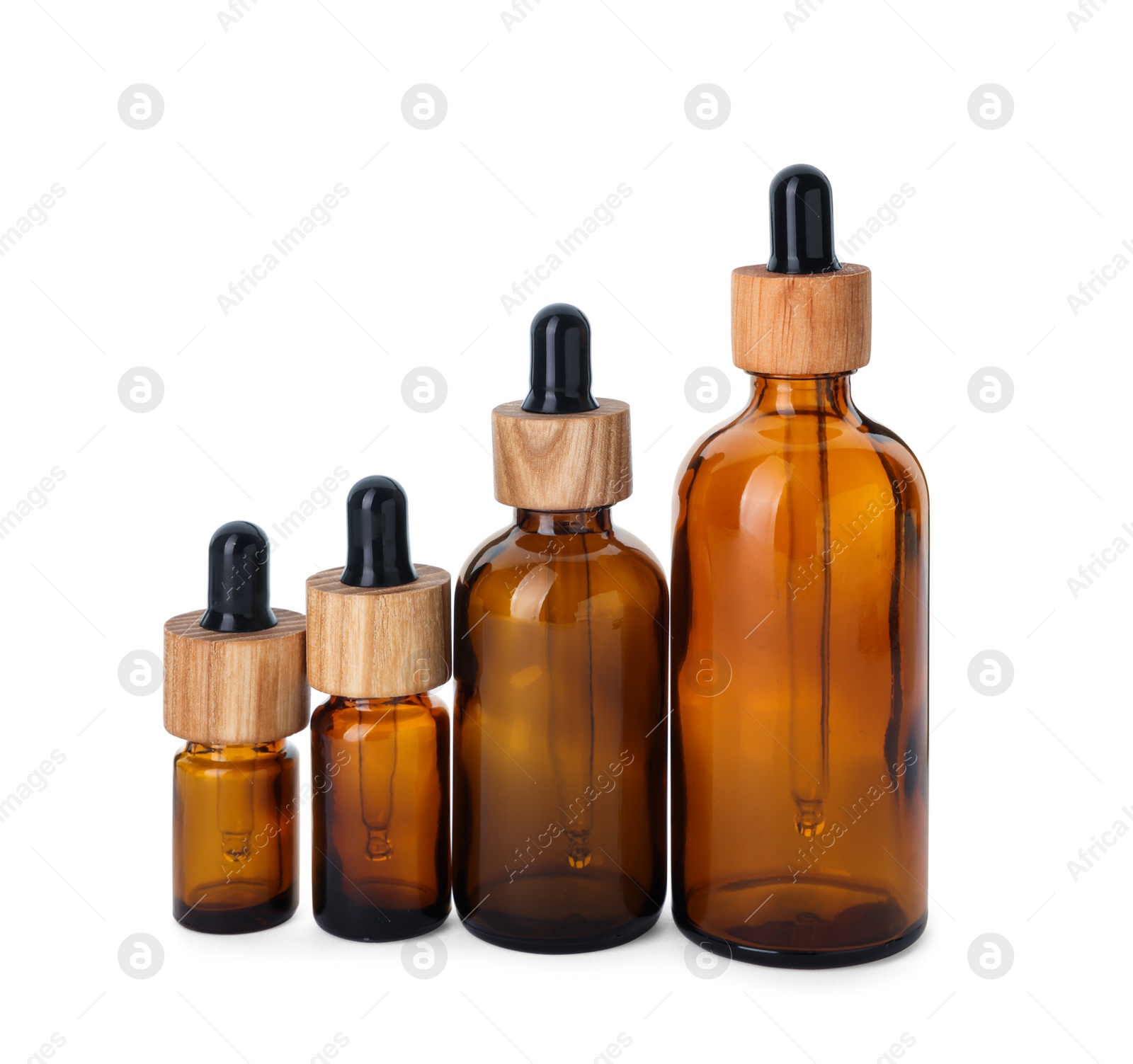 Photo of New empty glass bottles with droppers isolated on white