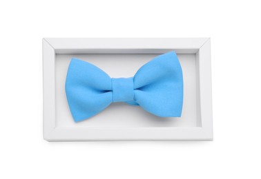 Photo of Stylish light blue bow tie on white background, top view