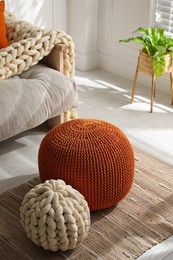 Photo of Stylish comfortable poufs in room. Home design