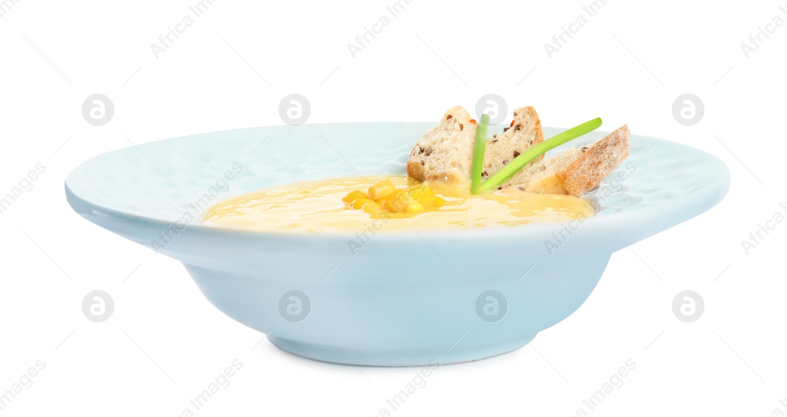 Photo of Delicious corn cream soup isolated on white