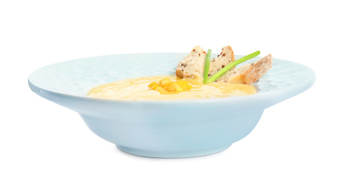 Photo of Delicious corn cream soup isolated on white