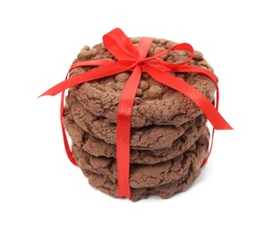 Photo of Tasty homemade chocolate chip cookies tied with red ribbon isolated on white