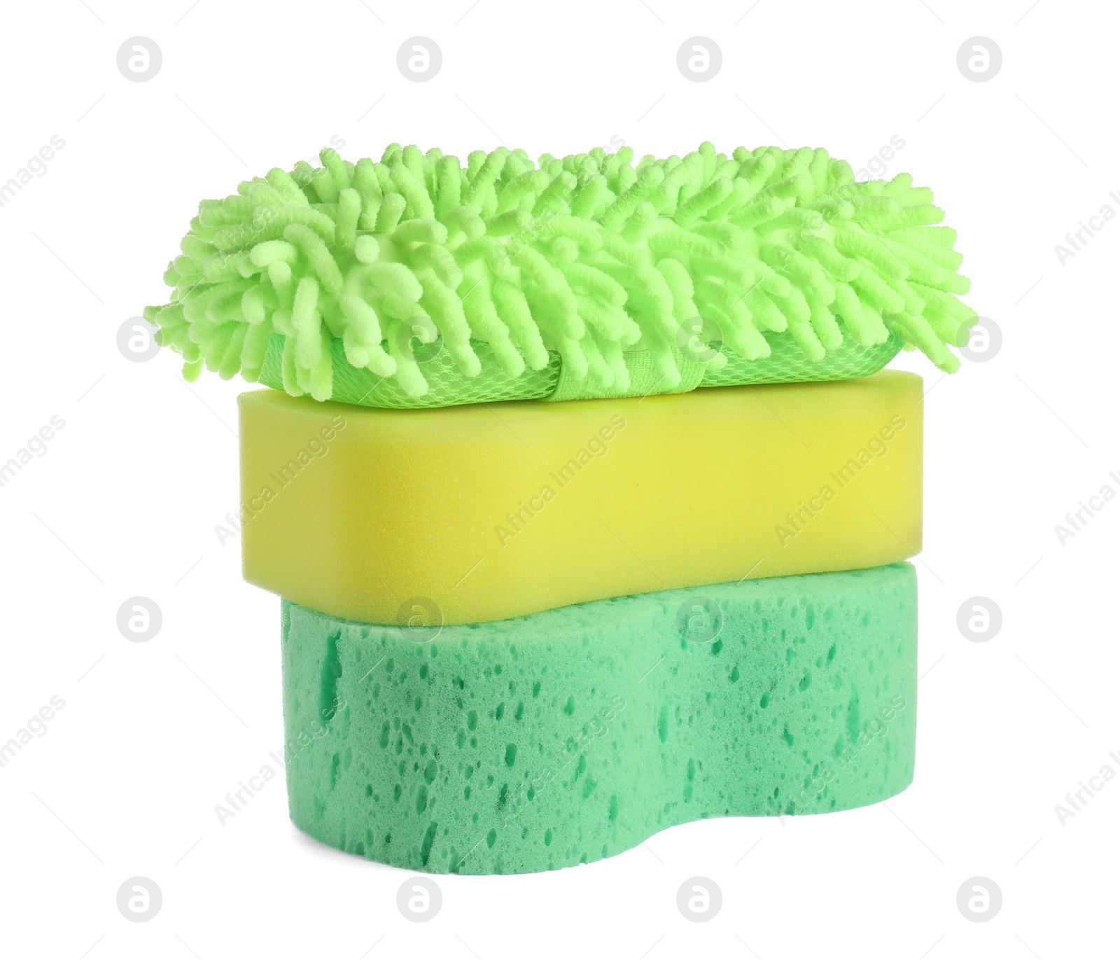 Photo of Sponges and car wash mitt on white background