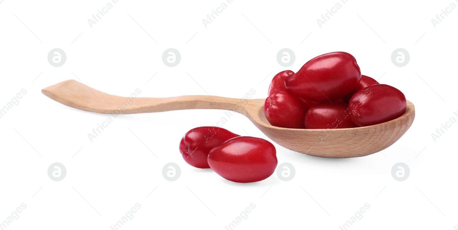 Photo of Fresh ripe dogwood berries and wooden spoon on white background