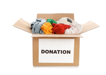 Photo of Carton box with donations on white background