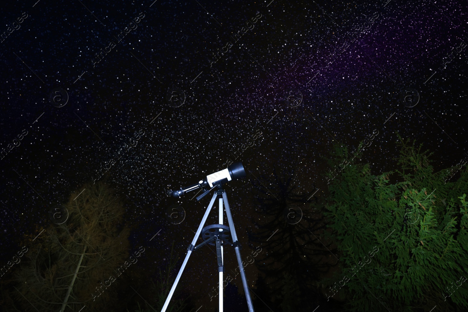 Photo of Modern telescope and beautiful sky in night outdoors. Learning astronomy