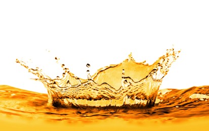 Golden oily liquid splash on white background