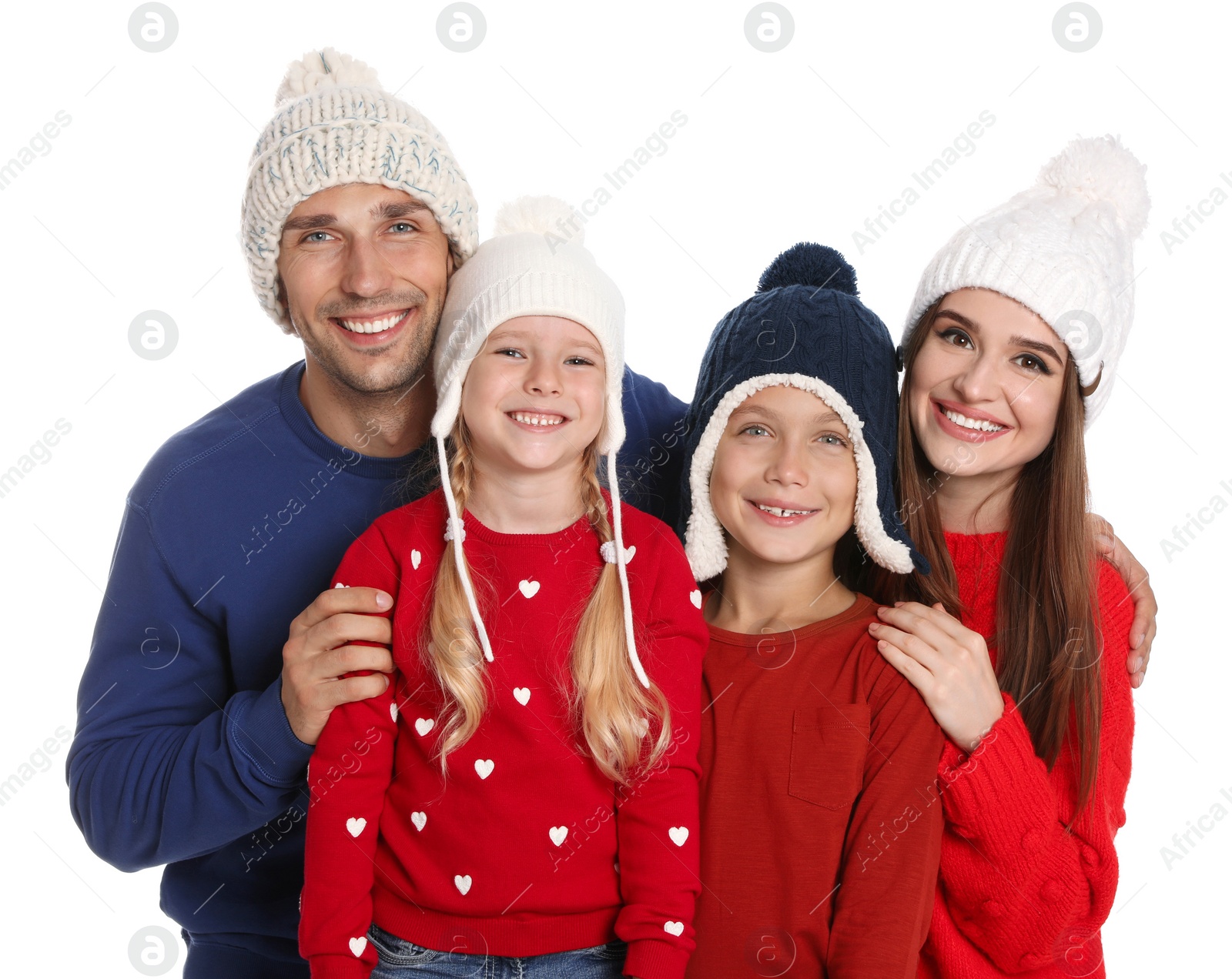 Photo of Happy family in warm clothes on white background. Winter season