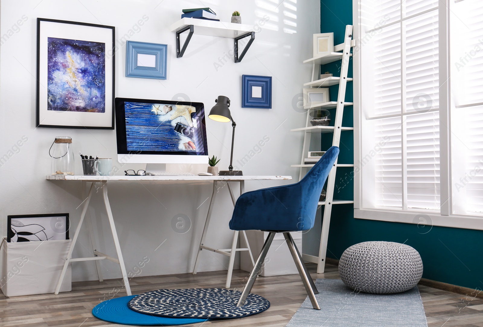 Photo of Home workplace with modern computer and desk in room