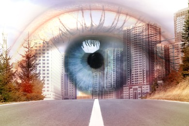 Double exposure of cityscape and woman with beautiful eye, closeup