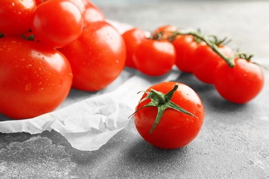 Fresh ripe red tomatoes on table