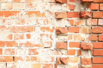 Photo of Texture of old red brick wall as background