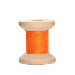 Wooden spool of orange sewing thread isolated on white