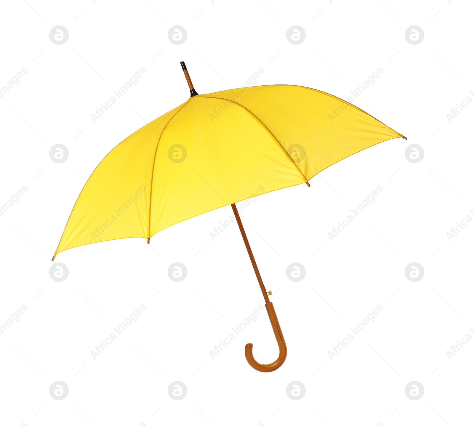 Photo of Modern opened yellow umbrella isolated on white