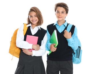 Happy pupils in school uniform on white background