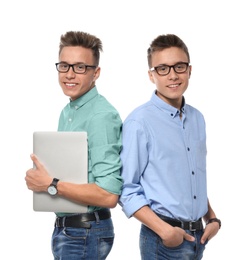 Photo of Teenage twin brothers with glasses on white background