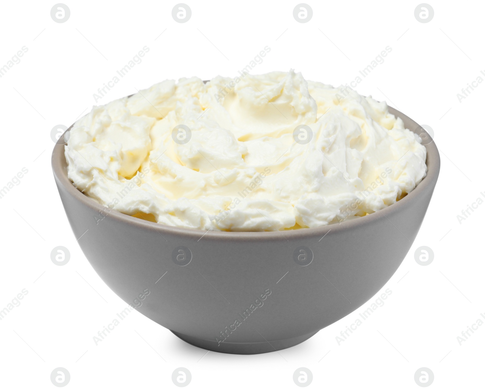 Photo of Bowl of tasty cream cheese isolated on white 