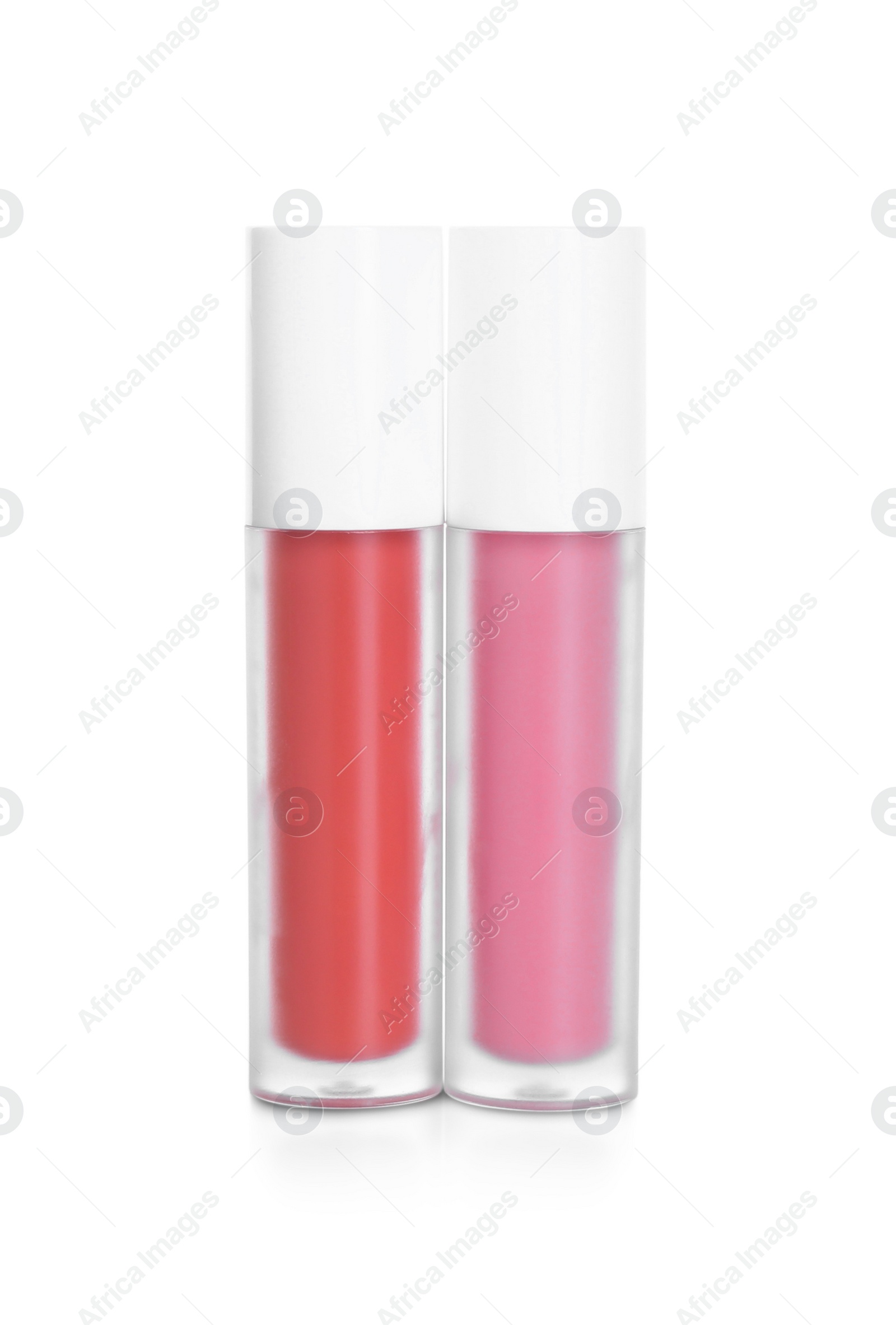 Photo of Two lip glosses isolated on white. Cosmetic products