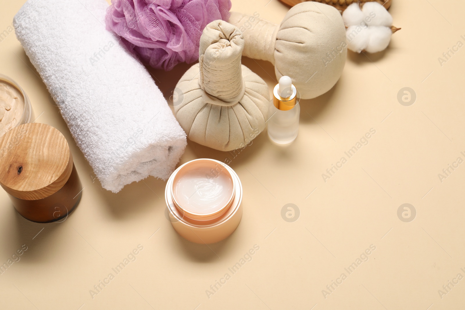 Photo of Bath accessories. Personal care products on beige background, above view. Space for text