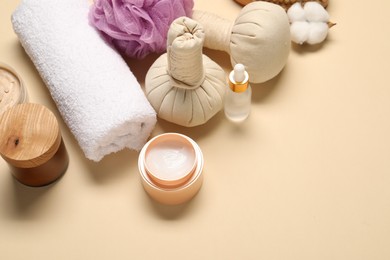 Photo of Bath accessories. Personal care products on beige background, above view. Space for text