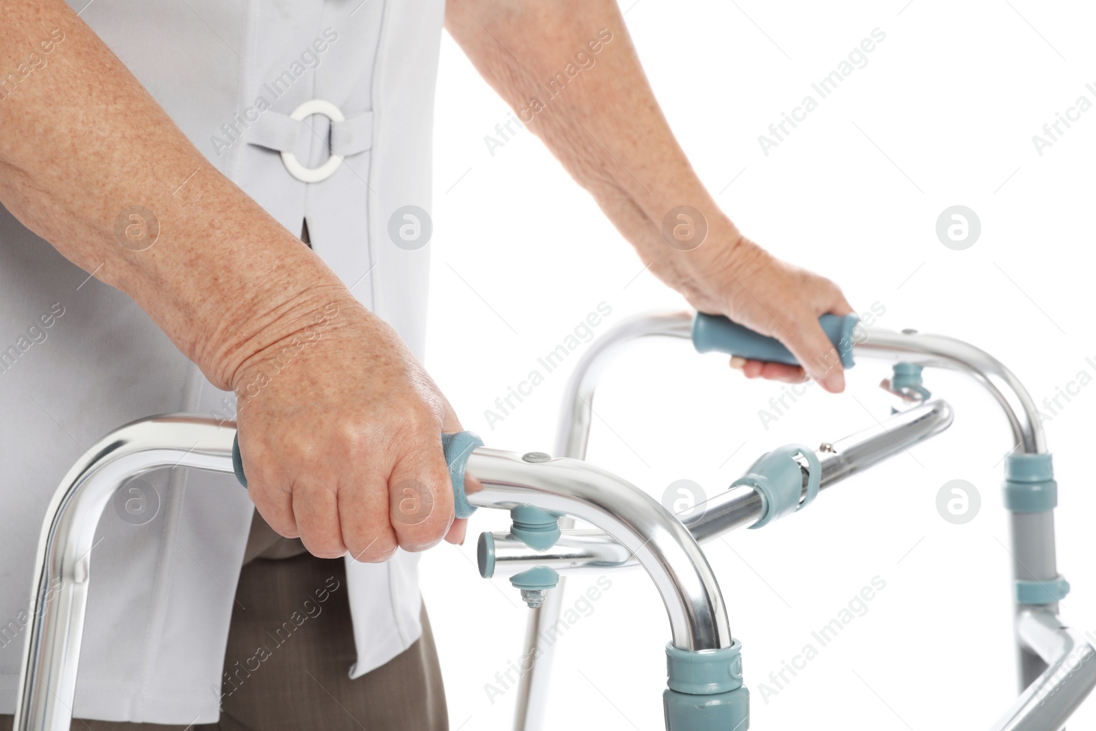 Photo of Elderly woman using walking frame isolated on white, closeup