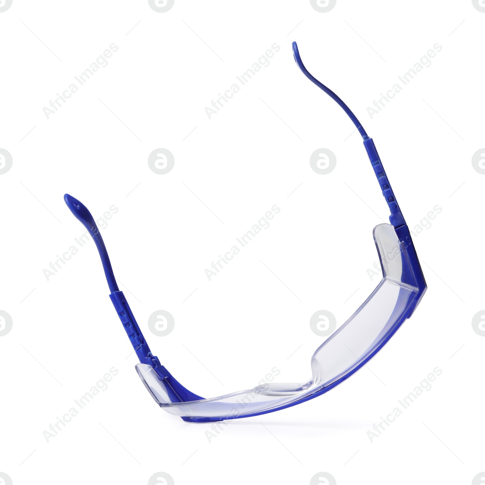 Photo of Protective goggles on white background. Construction tool