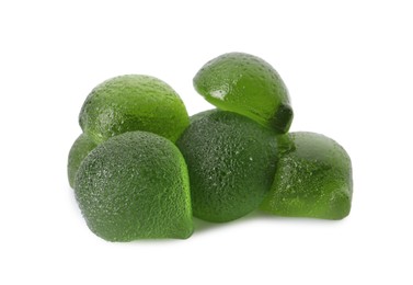 Pile of delicious gummy lime candies on white background