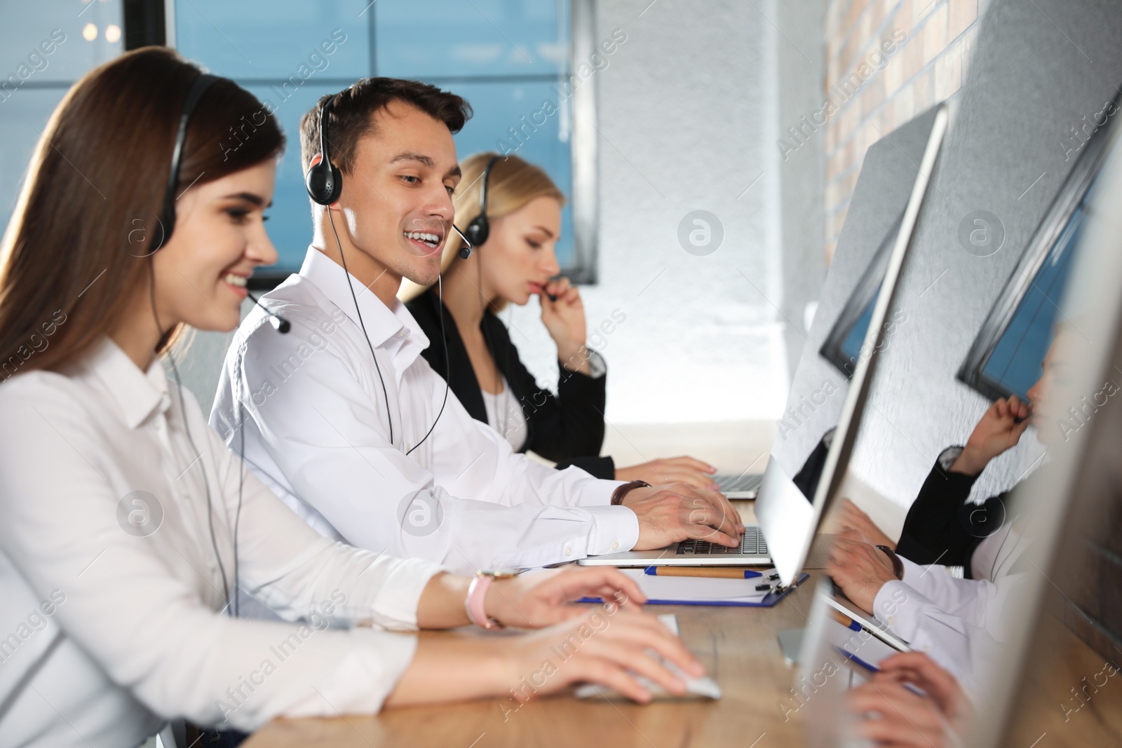 Photo of Technical support team working in modern office