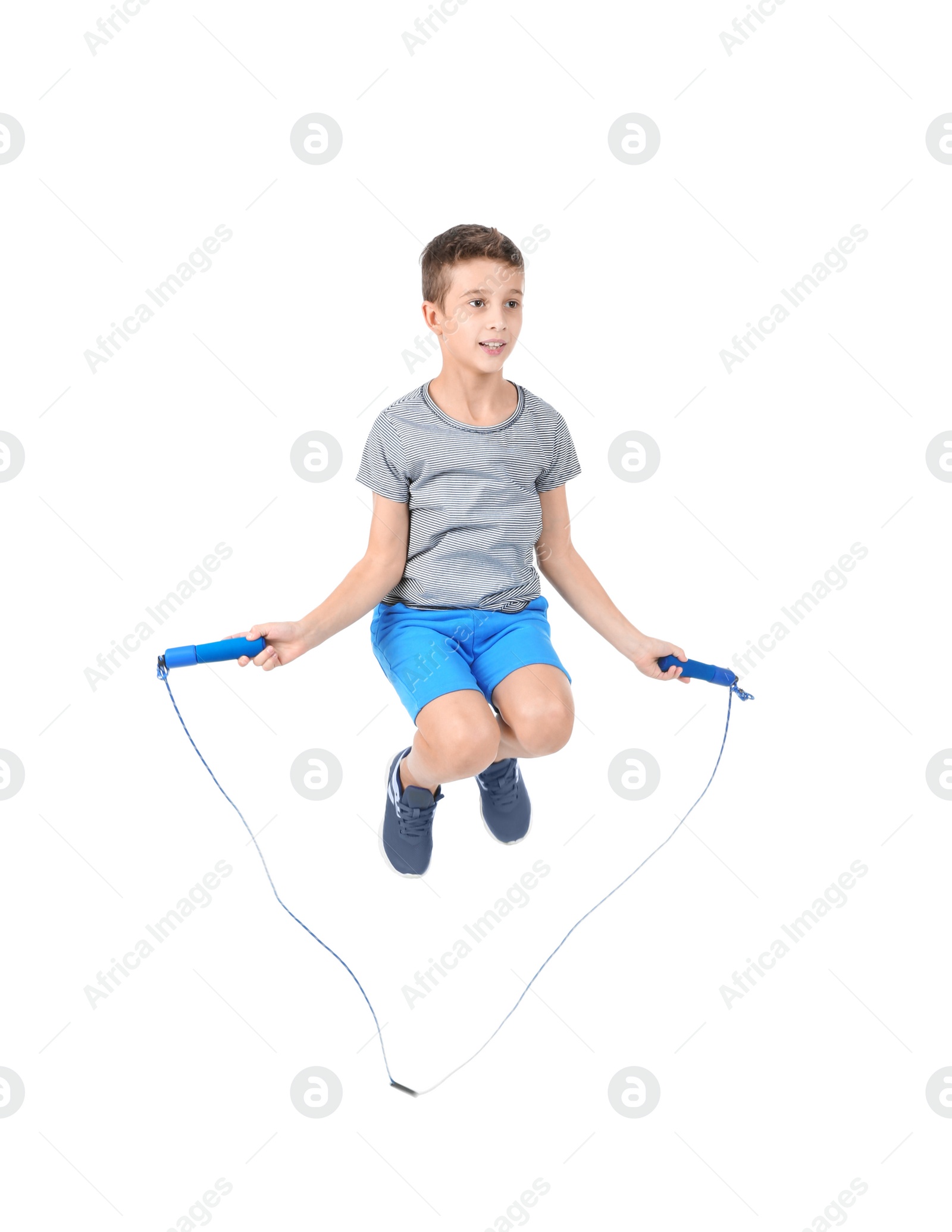 Photo of Full length portrait of boy jumping rope on white background