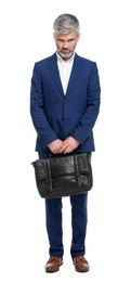 Photo of Mature businessman with briefcase posing on white background