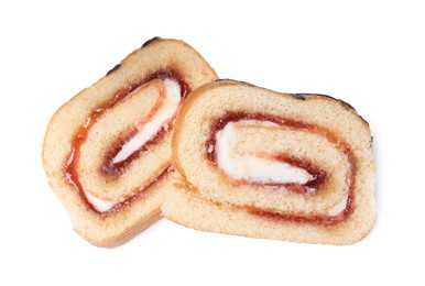 Slices of tasty cake roll with cream and jam on white background, top view