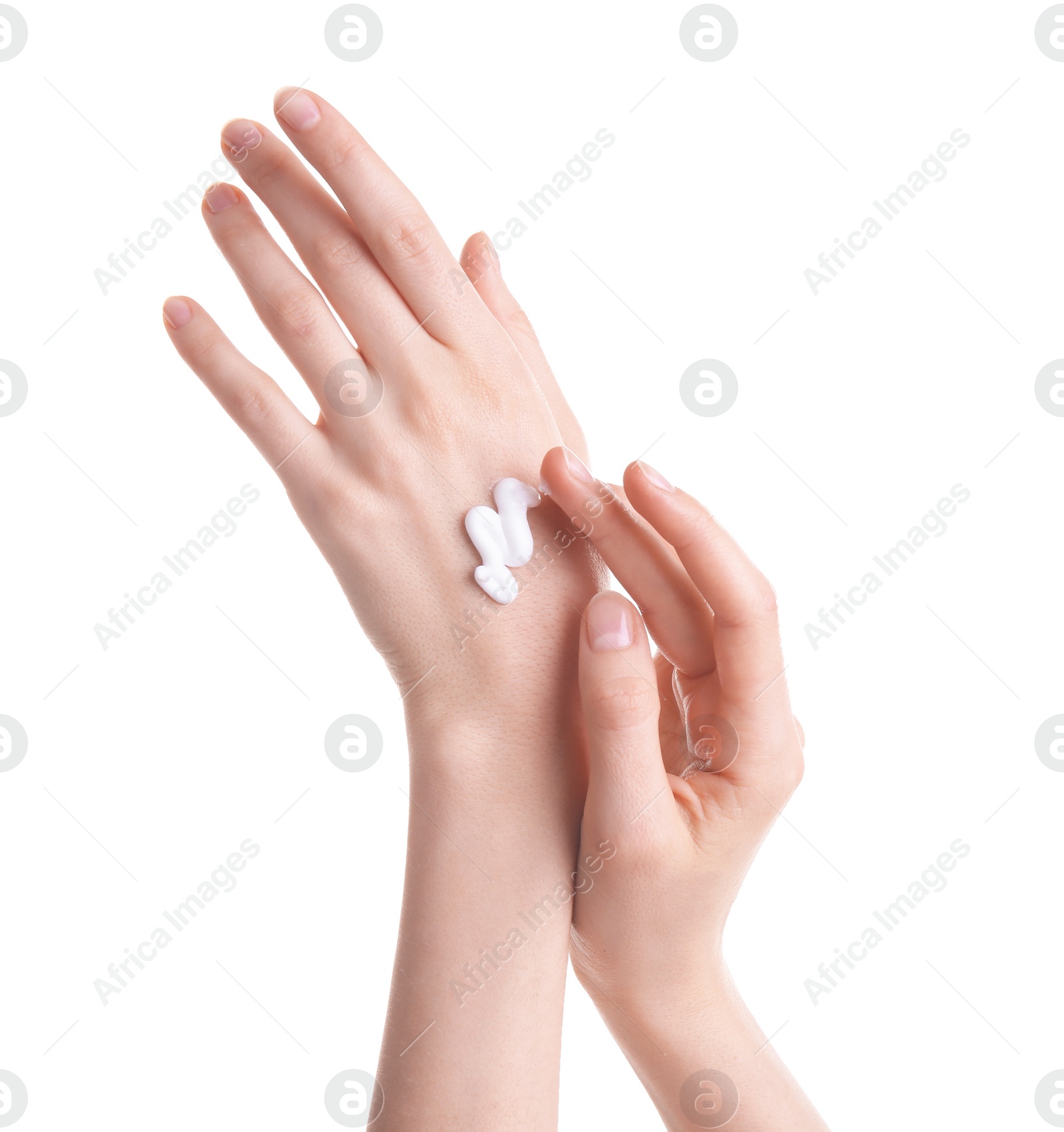 Photo of Young woman applying hand cream against on white background
