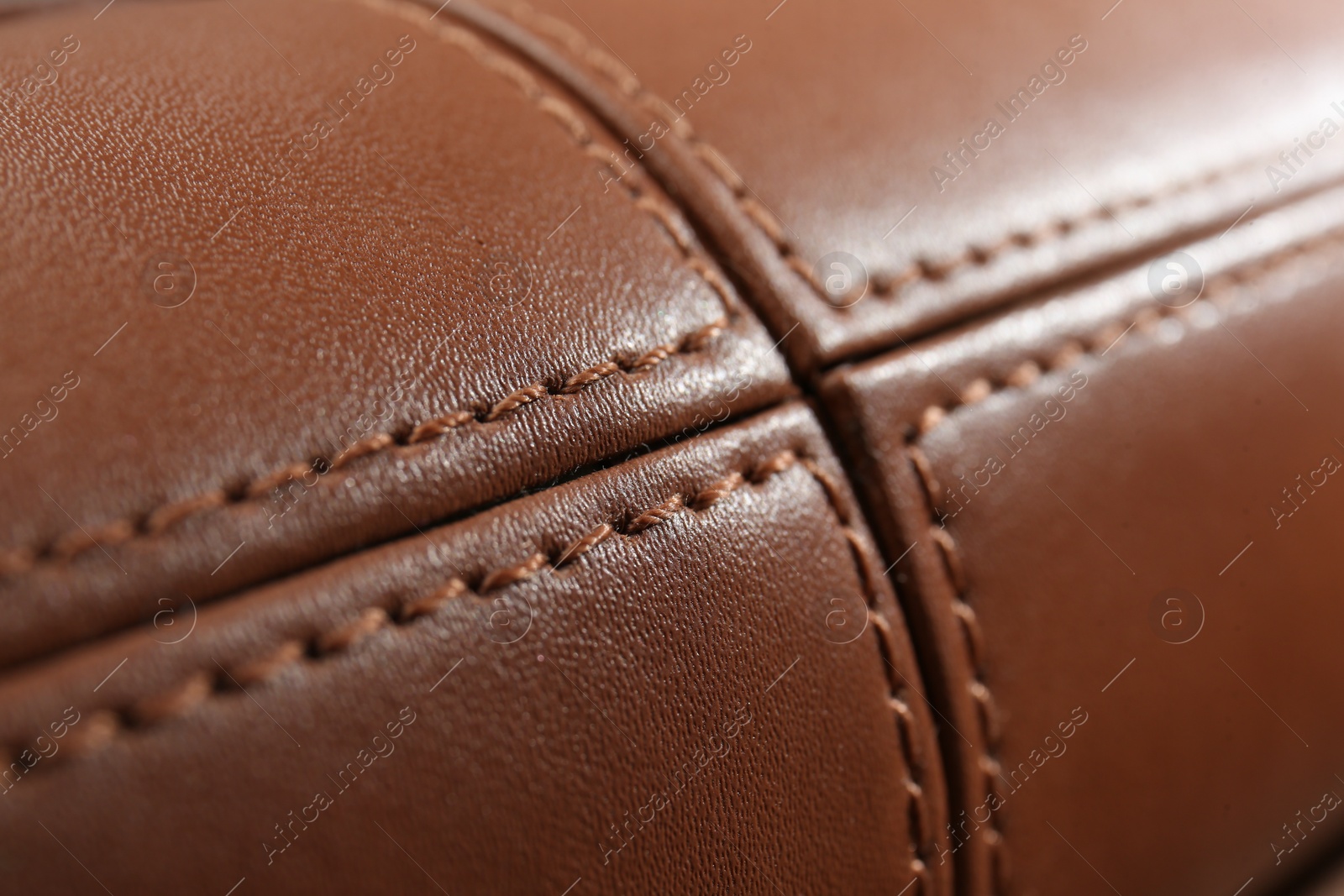 Photo of Texture of brown leather as background, closeup