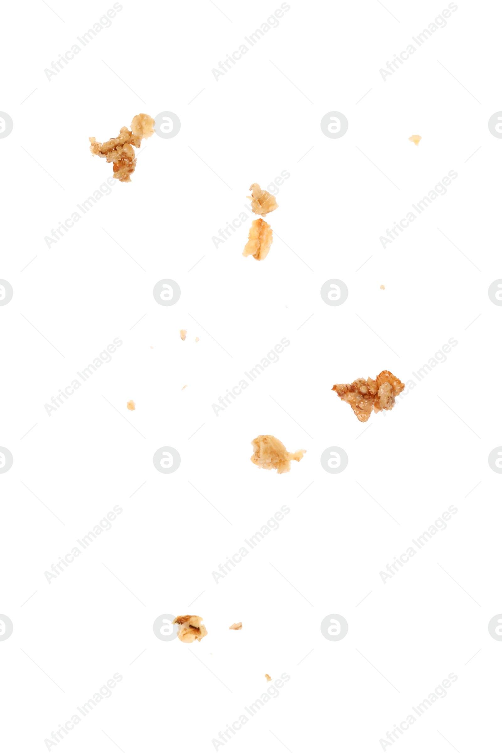 Photo of Pieces of tasty granola isolated on white