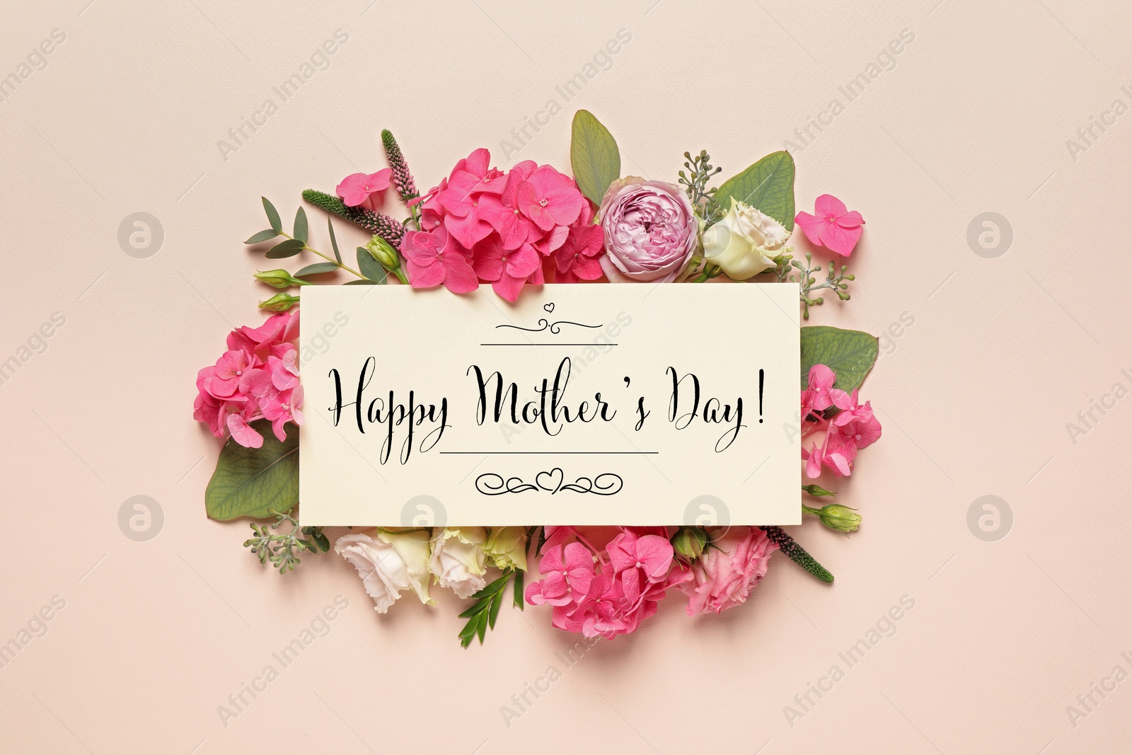 Image of Happy Mother's Day greeting card and beautiful flowers on beige background, flat lay