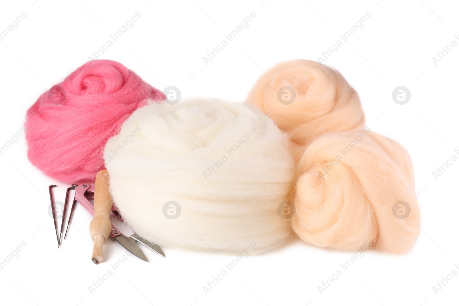 Photo of Set of colorful felting wool, scissors and needles isolated on white