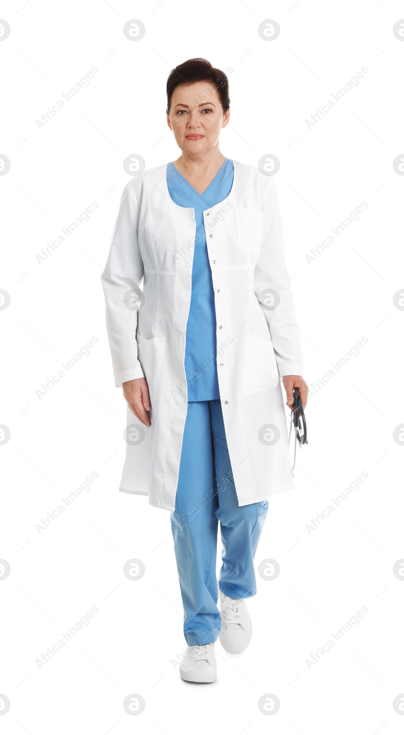 Photo of Full length portrait of female doctor isolated on white. Medical staff