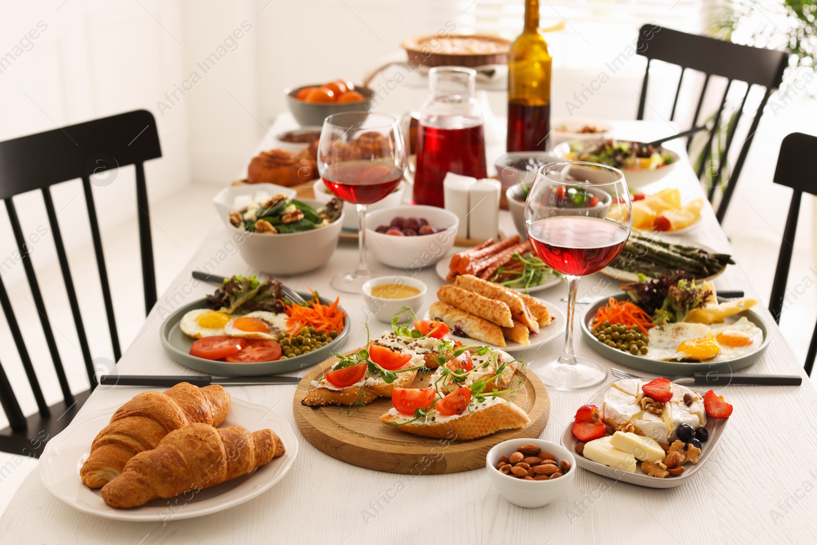 Photo of Many different dishes served on buffet table for brunch