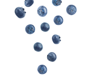 Image of Fresh ripe blueberries falling on white background