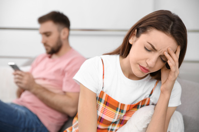 Unhappy couple with problems in relationship at home