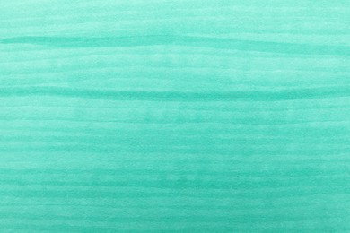 Photo of Abstract painting drawn with turquoise marker as background, top view