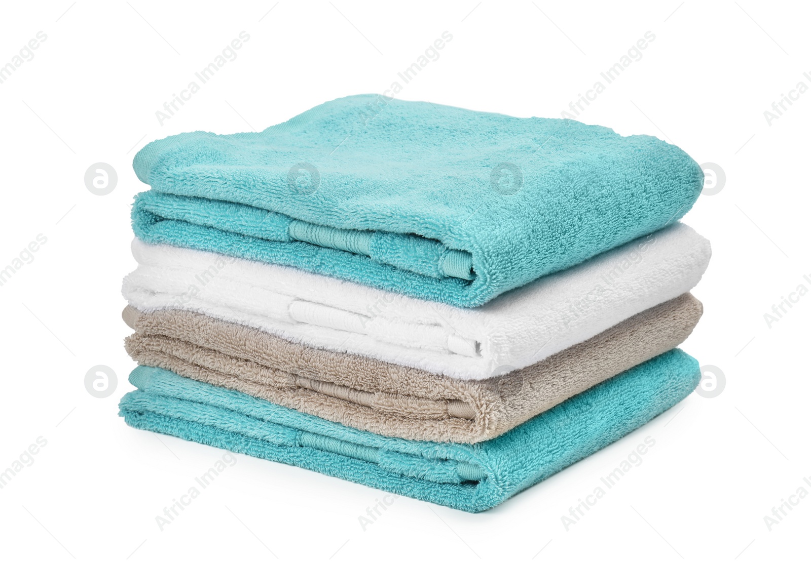 Photo of Stack of clean soft towels on white background