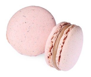 Photo of Delicious pink macarons on white background, top view