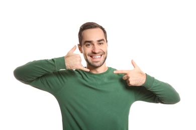 Photo of Man showing CALL ME gesture in sign language on white background