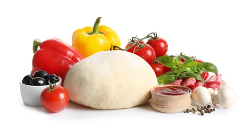 Photo of Fresh dough and ingredients for pizza on white background