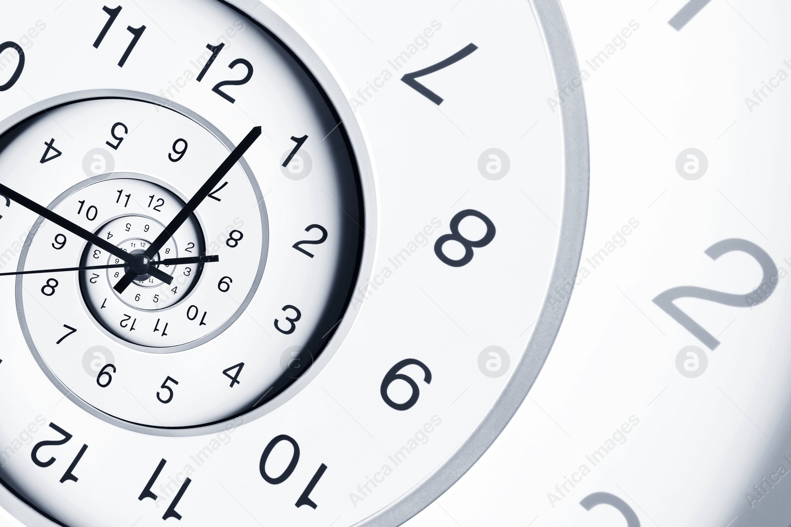 Image of Infinity and other time related concepts. White clock face twisted in spiral, fractal pattern