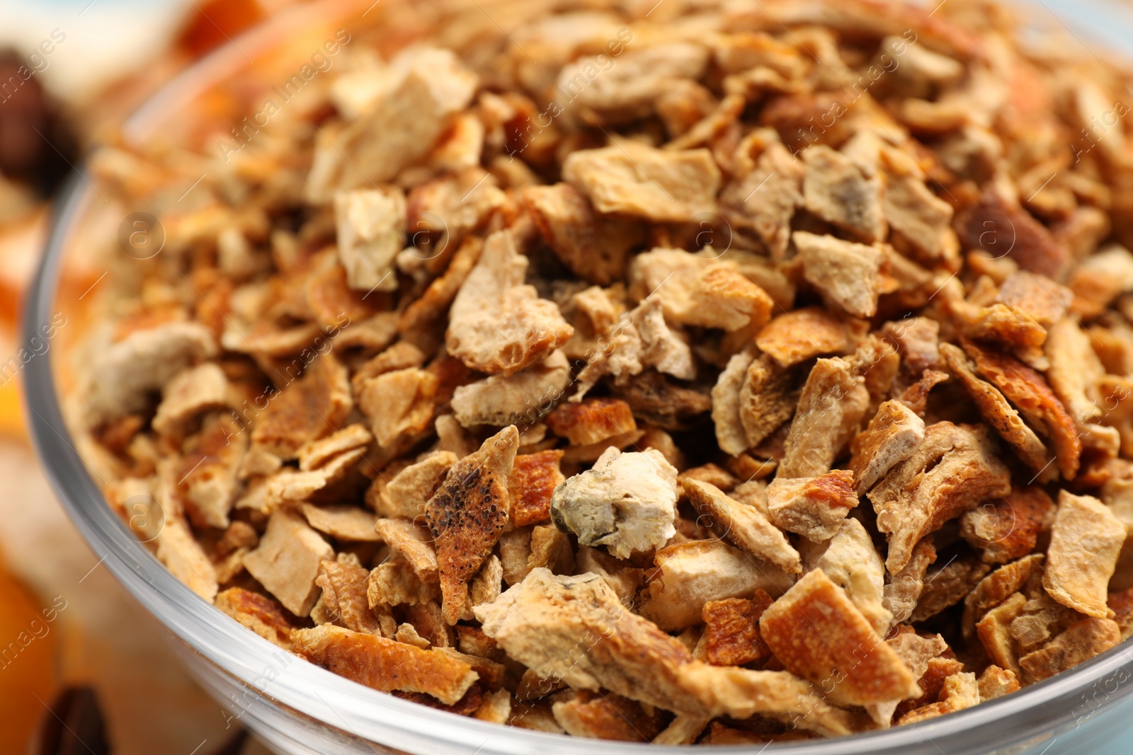 Photo of Bowl of dried orange zest seasoning, closeup