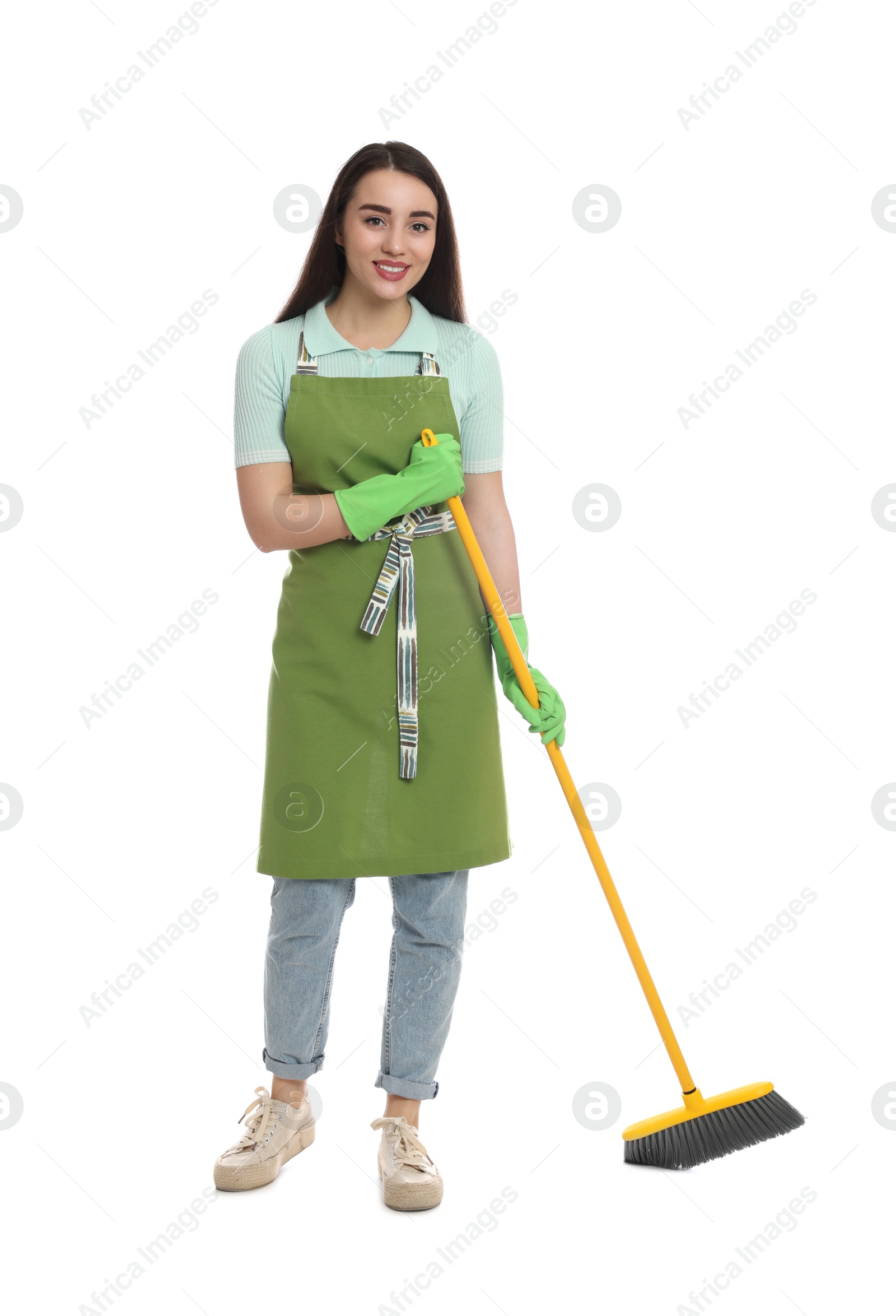 Photo of Beautiful young woman with broom on white background